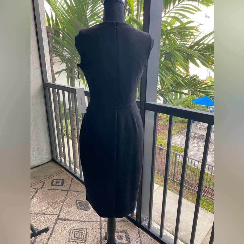 Calvin Klein black dress with gold zipper in front